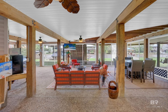 view of patio / terrace featuring ceiling fan, outdoor dining area, and an outdoor hangout area