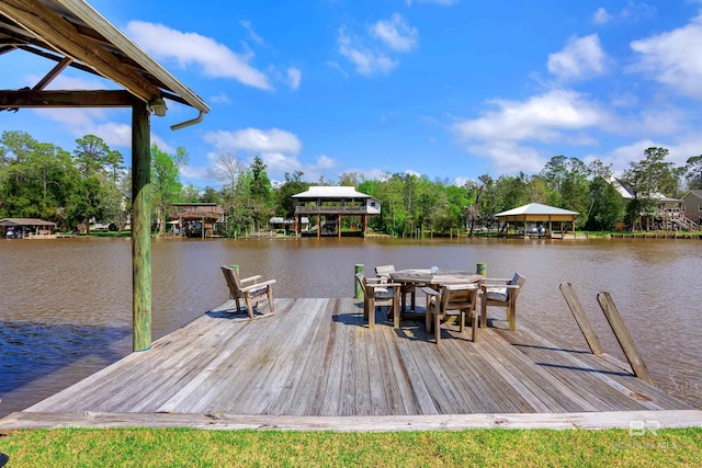 dock area featuring a gazebo and a water view