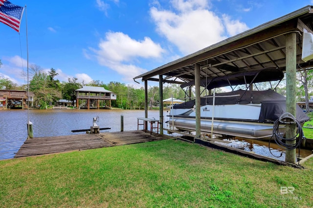 view of dock featuring a water view, a yard, and boat lift