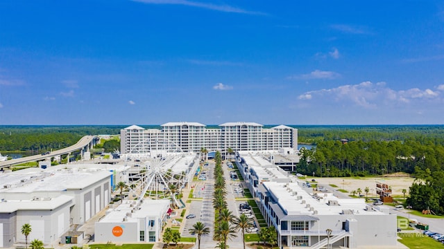 birds eye view of property featuring a city view