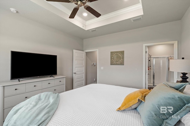 10487 Sand Dune Ave, Mobile, AL 36695 - bedroom featuring a tray ceiling, ornamental molding, recessed lighting, a ceiling fan, and ensuite bathroom