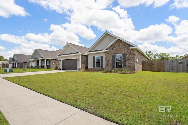10487 Sand Dune Ave, Mobile, AL 36695 - craftsman inspired home with concrete driveway, brick siding, board and batten siding, and an attached garage