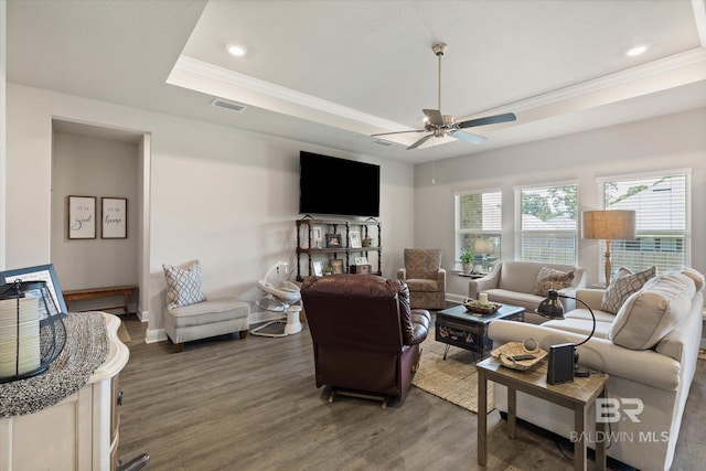 10487 Sand Dune Ave, Mobile, AL 36695 - living room with a tray ceiling, crown molding, wood finished floors, ceiling fan, and baseboards