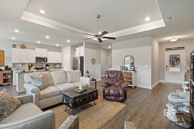 10487 Sand Dune Ave, Mobile, AL 36695 - living area with a tray ceiling, crown molding, baseboards, a ceiling fan, and recessed lighting
