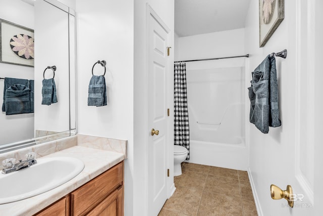 bathroom featuring tile patterned floors, a shower with curtain, vanity, and toilet