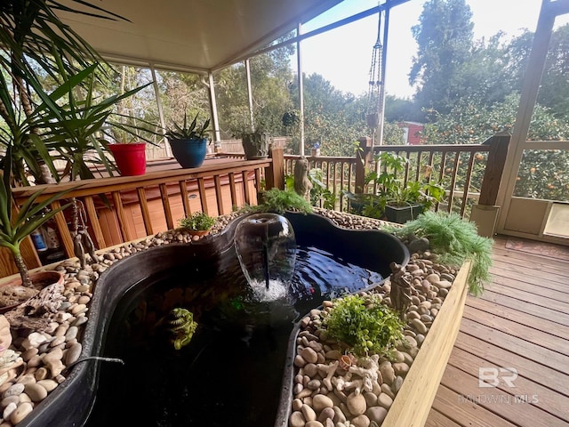 sunroom / solarium with lofted ceiling