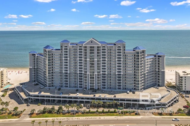 aerial view with a beach view and a water view