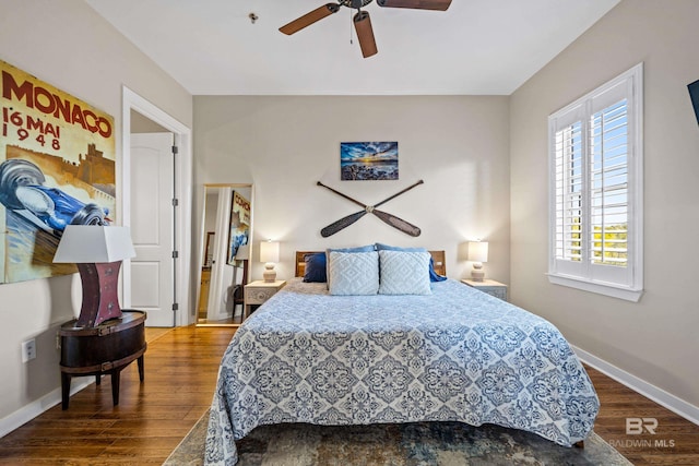 bedroom with hardwood / wood-style floors and ceiling fan