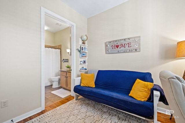 sitting room featuring light wood-type flooring