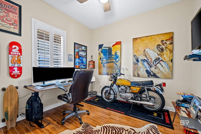 office area featuring wood-type flooring and ceiling fan