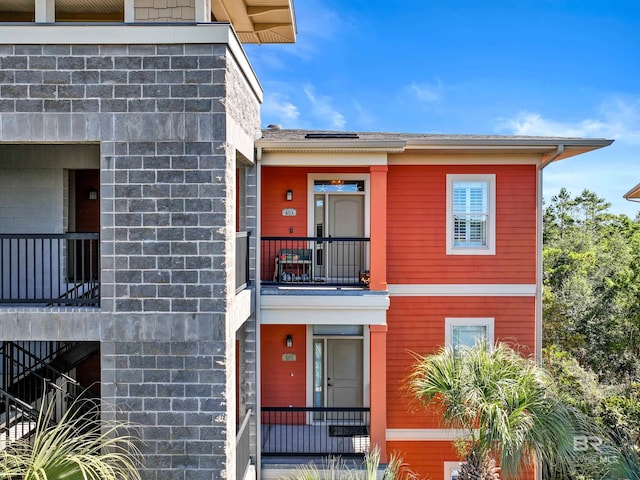 view of front of home with a balcony