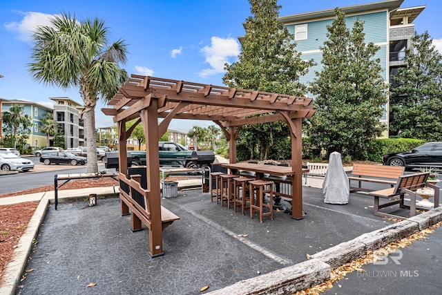 view of home's community featuring a pergola