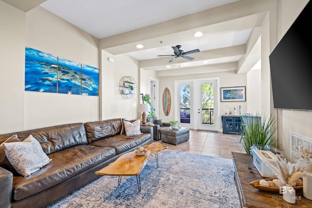 tiled living room with ceiling fan