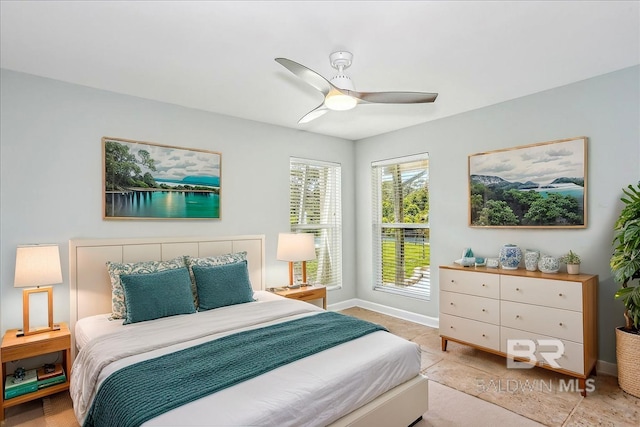 5553 Ponte Verde Rd, Pensacola, FL 32507 - bedroom with baseboards and ceiling fan