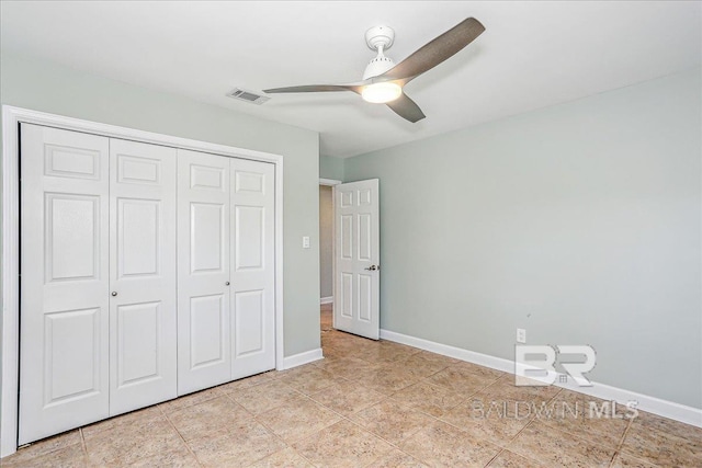 5553 Ponte Verde Rd, Pensacola, FL 32507 - unfurnished bedroom featuring a ceiling fan, baseboards, light tile patterned floors, visible vents, and a closet