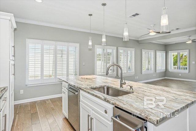 5553 Ponte Verde Rd, Pensacola, FL 32507 - kitchen featuring baseboards, a sink, crown molding, and open floor plan