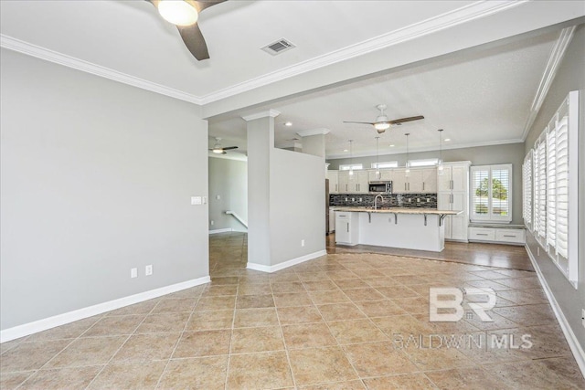 5553 Ponte Verde Rd, Pensacola, FL 32507 - unfurnished living room featuring visible vents, crown molding, baseboards, and ceiling fan