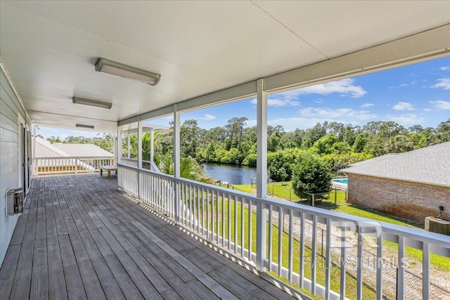 5553 Ponte Verde Rd, Pensacola, FL 32507 - wooden terrace featuring a yard, a water view, and cooling unit