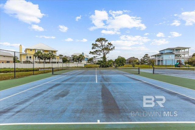 5553 Ponte Verde Rd, Pensacola, FL 32507 - view of tennis court with fence and a residential view