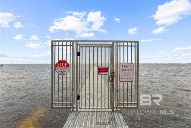 5553 Ponte Verde Rd, Pensacola, FL 32507 - exterior space featuring a gate and a water view