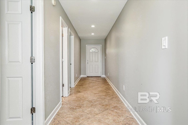 5553 Ponte Verde Rd, Pensacola, FL 32507 - hallway with light tile patterned flooring, baseboards, and recessed lighting