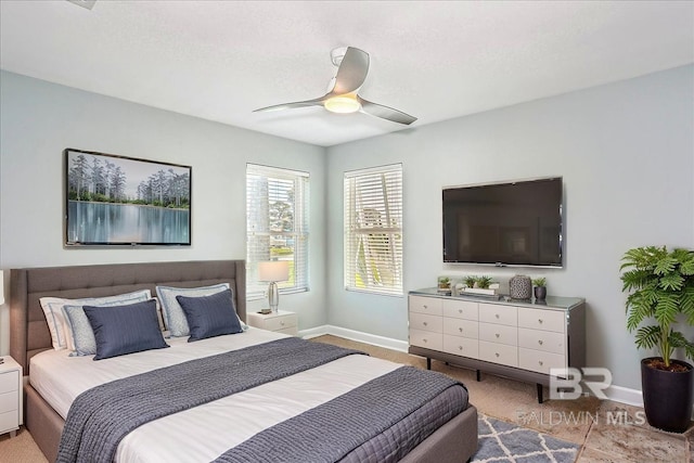 5553 Ponte Verde Rd, Pensacola, FL 32507 - bedroom featuring baseboards, light colored carpet, and ceiling fan