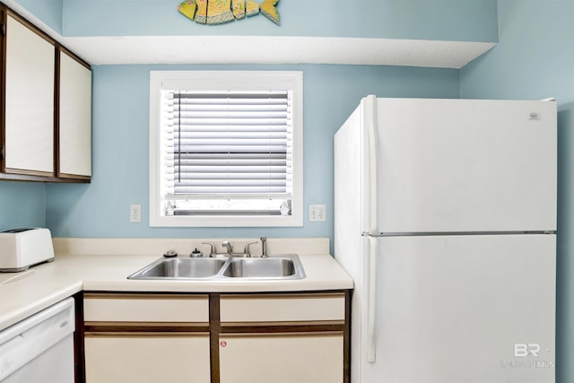 24522 Perdido Beach Blvd Unit 4909, Orange Beach, AL 36561 - kitchen with white appliances, healthy amount of natural light, light countertops, and white cabinetry