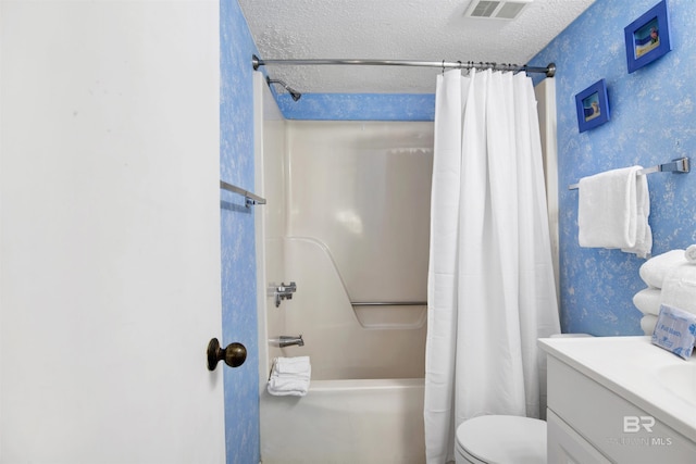 24522 Perdido Beach Blvd Unit 4909, Orange Beach, AL 36561 - full bath with shower / bath combo with shower curtain, wallpapered walls, a textured ceiling, and vanity
