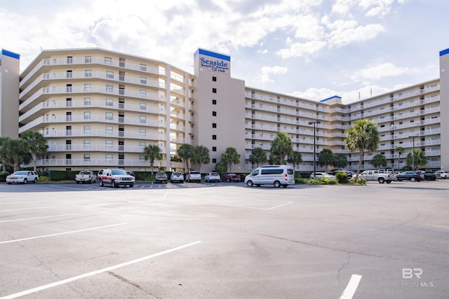 24522 Perdido Beach Blvd Unit 4909, Orange Beach, AL 36561 - view of apartment building / complex with uncovered parking