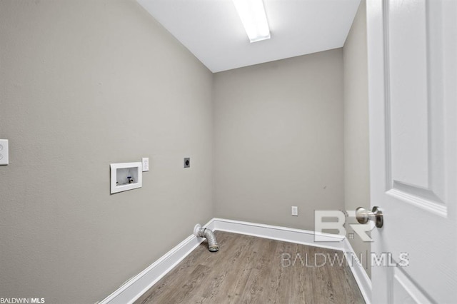 laundry area featuring hookup for a washing machine, electric dryer hookup, wood finished floors, laundry area, and baseboards