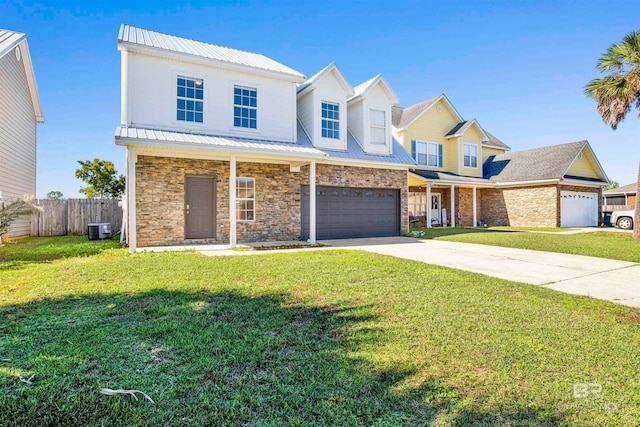 view of front of home featuring a porch, cooling unit, a garage, and a front lawn