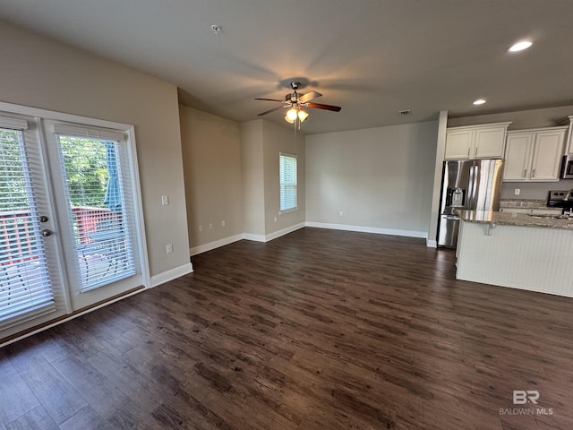 6811 Spaniel Dr Unit C, Spanish Fort, AL 36527 - unfurnished living room with ceiling fan, dark wood-type flooring, recessed lighting, and baseboards