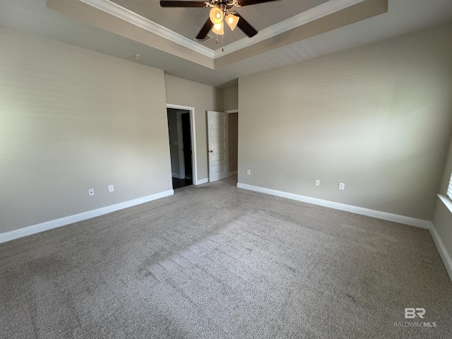 6811 Spaniel Dr Unit C, Spanish Fort, AL 36527 - spare room featuring a raised ceiling, a ceiling fan, ornamental molding, carpet flooring, and baseboards