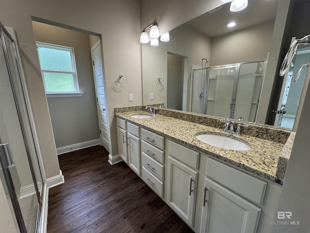 6811 Spaniel Dr Unit C, Spanish Fort, AL 36527 - full bath with a shower stall, wood finished floors, double vanity, and baseboards