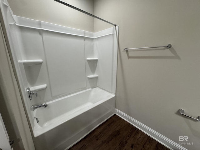6811 Spaniel Dr Unit C, Spanish Fort, AL 36527 - bathroom with baseboards, wood finished floors, and bathtub / shower combination
