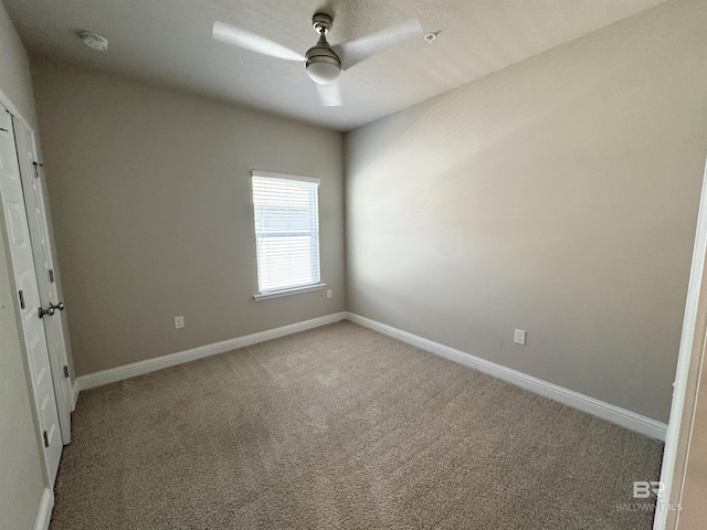 6811 Spaniel Dr Unit C, Spanish Fort, AL 36527 - unfurnished room featuring light carpet, baseboards, ceiling fan, and a smoke detector