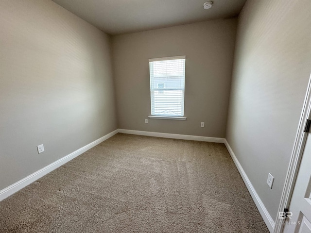 6811 Spaniel Dr Unit C, Spanish Fort, AL 36527 - spare room with carpet, baseboards, and a smoke detector