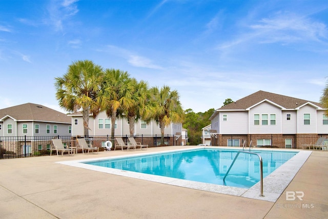 6811 Spaniel Dr Unit C, Spanish Fort, AL 36527 - community pool with a patio area and a residential view