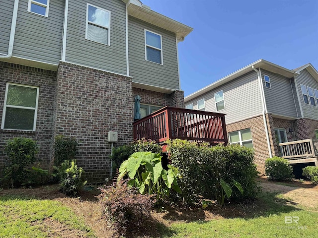 6811 Spaniel Dr Unit C, Spanish Fort, AL 36527 - rear view of property with brick siding and a deck