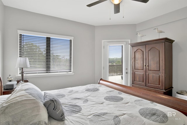 bedroom featuring ceiling fan and access to exterior