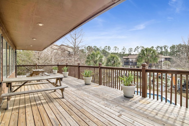 deck with a swimming pool