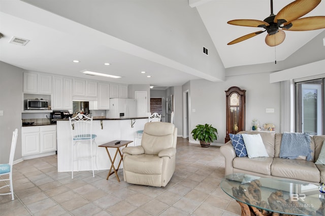 living room featuring light tile patterned floors, baseboards, visible vents, lofted ceiling, and recessed lighting