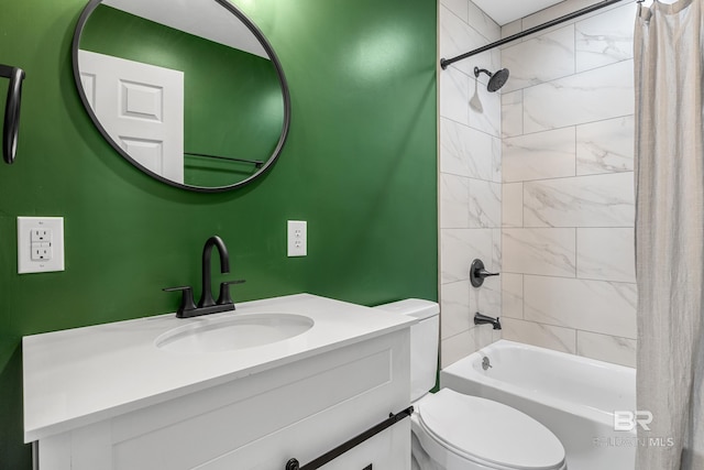 full bathroom with shower / tub combo, vanity, and toilet