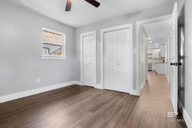 unfurnished bedroom with wood-type flooring and ceiling fan