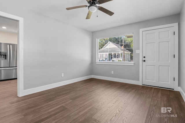 entryway with ceiling fan and hardwood / wood-style flooring