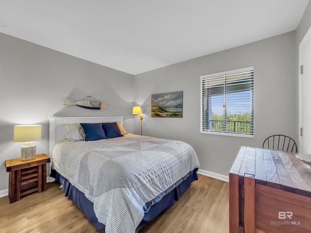 bedroom featuring hardwood / wood-style floors