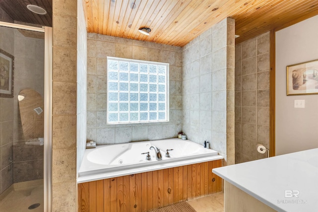 42168 Bayou Rd, Bay Minette, AL 36507 - full bath with a shower stall, a whirlpool tub, tile walls, and wooden ceiling