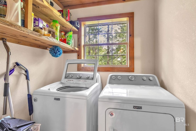 42168 Bayou Rd, Bay Minette, AL 36507 - laundry area featuring separate washer and dryer and a textured wall