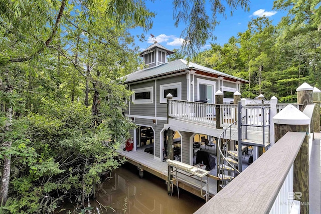 42168 Bayou Rd, Bay Minette, AL 36507 - back of property featuring a metal roof and a deck with water view