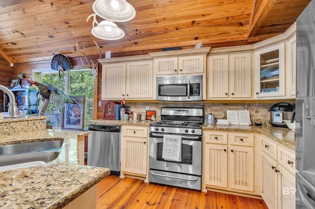 42168 Bayou Rd, Bay Minette, AL 36507 - kitchen with appliances with stainless steel finishes, wood ceiling, decorative backsplash, light wood-style floors, and glass insert cabinets